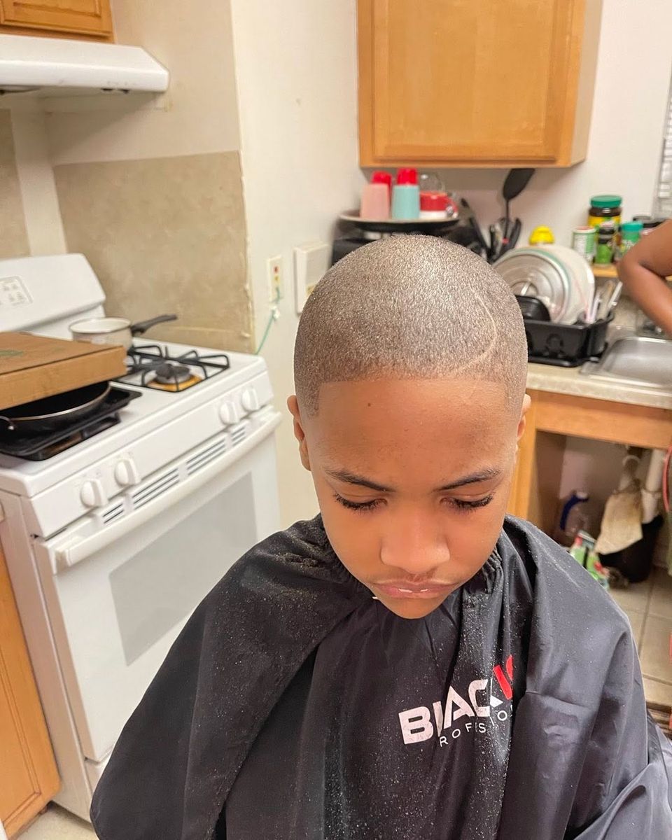 Kids even buzz cut with a crisp front line-up